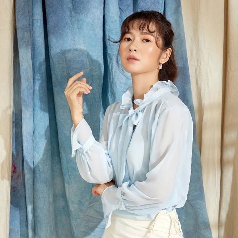 Hình ảnh sâu lắng trong màn biểu diễn của ca sĩ Nguyễn Kiều Oanh