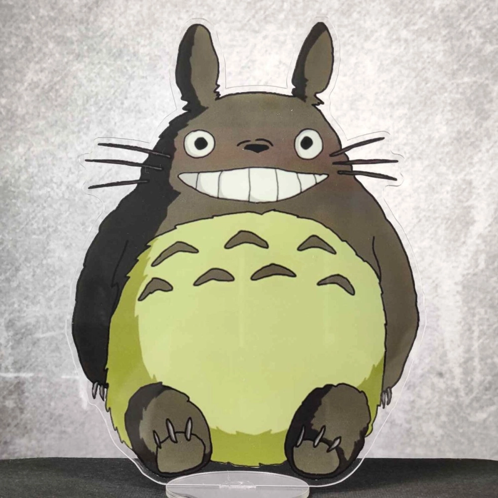 Totoro poster nổi bật với hình ảnh rừng và ô xanh
